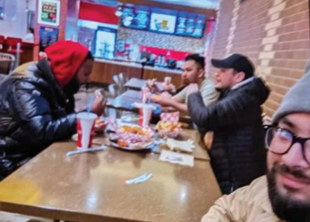 Long “Bruce” Phi Pham, furthest back, pictured with his co-conspirators (right to left) Ammar Awawdeh, Timothy McCormac, and Mahmud Mollah in a restaurant at an Atlantic City casino where they allegedly placed the fraudulent bets. (Image: US Dist. Court for the Eastern Dist. of New York)